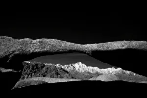 Images Dated 25th January 2024: California, Lone Pine, Alabama Hills, Lathe Arch with the Eastern Sierra Nevada Range