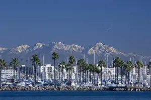 Images Dated 29th December 2008: California, Long Beach. Skyline views of the port area of Long Beach. Snow-capped