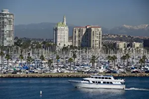 California, Long Beach. Skyline views of the port & marina area of Long Beach. Snow-capped