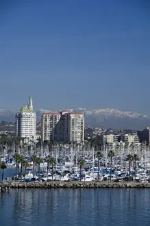 California, Long Beach. Skyline views of the port & marina area of Long Beach. Snow-capped