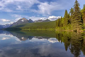 Calm reflection on Bowman Lake in Glacier National Park, Montana, USA