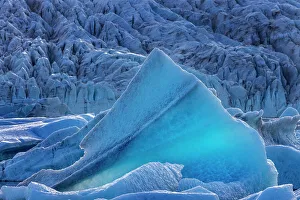Calving glacial ice in Fjallsarlon Lagoon, Iceland