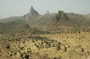 CAMEROON, Rhumsiki. Rocks rising in the middle of an arid landscape