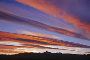 Images Dated 16th June 2013: Canada, Alberta, Burmis. CLouds at sunset over the Canadian Rocky Mountains. Credit as