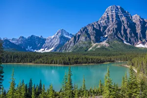 Canada Prints: Canada, Alberta. Glacial Silt colors Waterfowl Lake blue with Howse Peak in view