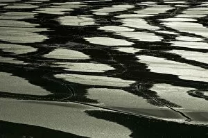 Images Dated 26th September 2005: Canada, Alberta, Jasper National Park. Pattern of water on ice in alpine lake. Credit as