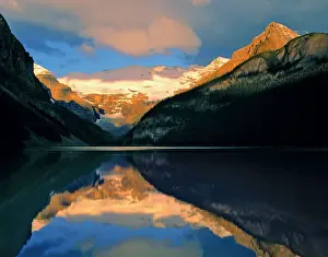 Ric Ergenbright Prints: Canada, Alberta, Lake Louise. Sunrise brightens the still waters of Lake Louise, Banff NP