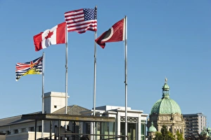 Images Dated 19th June 2015: Canada, BC, Victoria. Inner Harbour. Flags flying ferry terminal