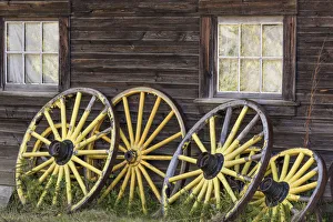 Wagon Prints: Canada, British Columbia, Barkerville. Wagon wheels lean on old building. Credit as