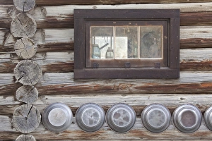Images Dated 29th September 2009: Canada, British Columbia, Fort Steele. Exterior view of window and gold pans on log cabin