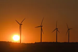 Images Dated 2nd July 2006: Canada, Manitoba, Somerset. Wind turbines at sunset