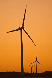 Images Dated 22nd August 2005: Canada, Manitoba, Somerset. Wind turbines at sunset