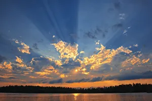 Images Dated 29th July 2018: Canada, Manitoba, Whiteshell Provincial Park, Crepuscular rays over Star Lake