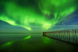 Images Dated 10th September 2011: Canada, Manitoba, Winnipeg. Northern Lights reflected in Lake Winnipeg. Credit as