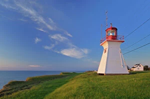 Places Collection: Canada, New Brunswick, Cap Lumiere. Richibucto Head Lighthouse and ocean. Credit as