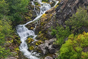 Canada, New Brunswick. River waterfall and rocky rapids