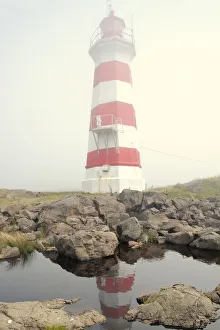 Brier Island Prints: Canada, Nova Scotia, Brier Island. Reflection of Brier Island Lighthouse in pond