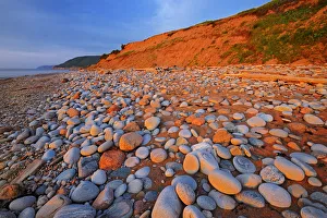 Images Dated 29th July 2009: Canada, Nova Scotia, Pleasant Bay. Sunset on shore of Gulf of St. Lawrence. Credit as