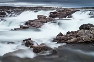 Northern Prints: Canada, Nunavut Territory, Blurred image of rushing waterfall near Bury Cove along