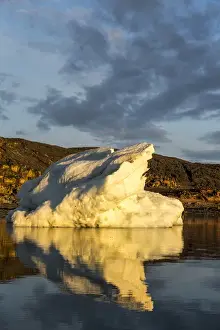 Midnight Sun Prints: Canada, Nunavut Territory, Midnight sun lights melting iceberg reflected in Frozen