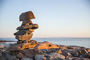 Images Dated 2nd September 2014: Canada, Nunavut, Territory, Setting sun lights stone cairns on Harbour Islands along