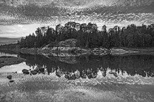 Images Dated 13th August 2020: Canada, Ontario, Kenora District. Black and white of clouds reflected in Middle Lake
