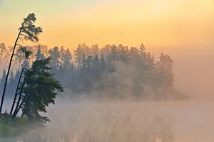 Images Dated 31st March 2018: Canada, Ontario, Kenora. Fog at sunrise on Isabel Lake. Credit as