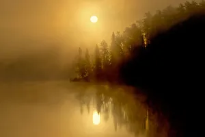 Images Dated 31st March 2018: Canada, Ontario, Kenora. Fog at sunrise on Isabel Lake. Credit as