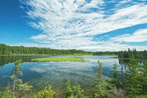 Prints of Canada, Ontario, Longlac. Clouds and wetland in a boreal forest Images Dated 2022 May: Canada, Ontario, Longlac. Clouds and wetland in a boreal forest