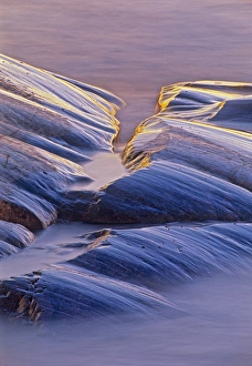 Great Lakes Prints: Canada, Ontario, Neys Provincial Park. Rock at edge of Lake Superior at sunset. Credit as
