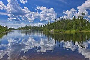 Canada, Ontario, Obatanga Provincial Park, Clouds reflected in Burnfield Lake