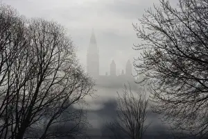 Ottawa River Prints: Canada, Ontario, Ottawa. Parliament Buildings seen between trees and ice fog on Ottawa River