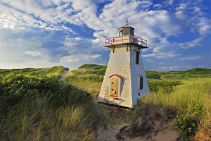 Images Dated 19th July 2009: Canada, Prince Edward Island, St. Peters Harbour. Lighthouse in sand dunes. Credit as