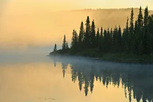 Images Dated 19th March 2019: Canada, Quebec, Chibougamau. Lake in fog at sunrise. Credit as