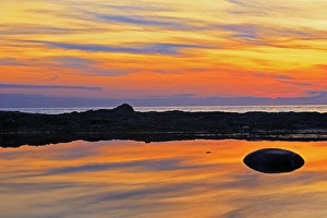 Images Dated 10th July 2009: Canada, Quebec, Gulf of St. Lawrence. Reflection on water at sunset