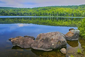 Images Dated 25th June 2021: Canada, Quebec, La Mauricie National Park. Rocks along Lake Bouchard shore