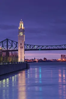 World Locations Prints: Canada, Quebec, Montreal, Old Port clocktower, dusk