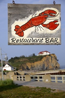Perce Prints: Canada, Quebec, Perce. Waterfront restaurant sign. IMAGE RESTRICTED: Not available