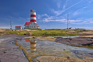 Lawrence Prints: Canada, Quebec. Pointe-des-Monts lighthouse along Gulf of St. Lawrence