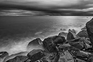 Stormy Prints: Canada, Quebec, Ruisseau Castor. Shoreline rocks on Gulf of St. Lawrence in storm light