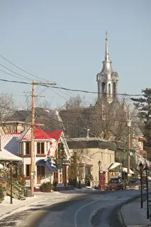 The Laurentians Prints: Canada-Quebec-The Laurentians: St-Sauveur des Monts-Town View with Town Church / Winter