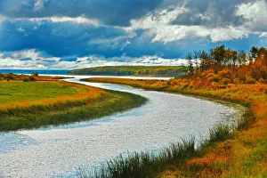 Green Lake Prints: Canada, Saskatchewan, Green Lake. River and storm clouds