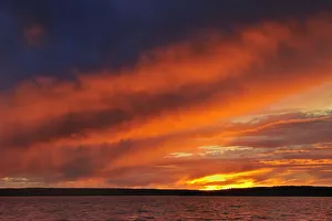 Canada, Saskatchewan, Prince Albert National Park. Storm on Waskesiu Lake at sunset
