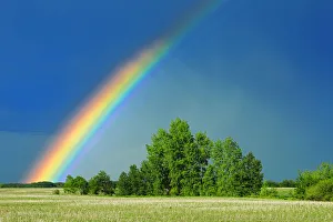 Canada, Saskatchewan, Wroxton. Rainbow over grassland