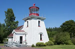 Images Dated 2029: Canada St Martins New Brunswick white tourist lighthouse in small fishing and lobster