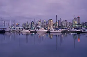 Stanley Park Prints: Canada, Vancouver B. C. city skylineand marina from Stanley Park at dusk
