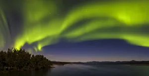 Canada Prints: Canada, Yukon. Northern lights reflected in Marsh Lake at Tagish