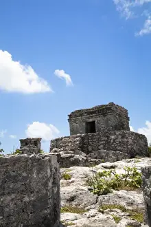 Inti St Clair Prints: Cancun, Quintana Roo, Mexico - Low angle view of an ancient stone structure on the top of a hill