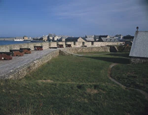 Cannons along the fortified wall of Fortress Louisbourg Nat l Historic Site along