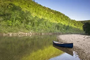 Canoe parked on a gravel bar, Mile 120 opposite the Tie Chute Bluff on the Buffalo River